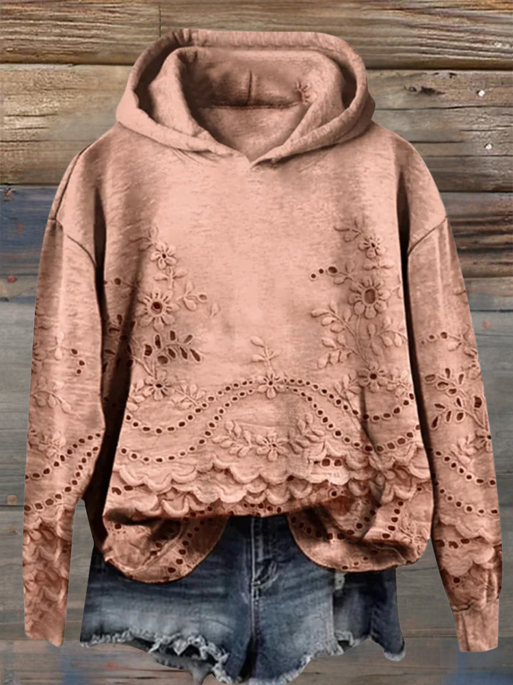 Brown floral-embroidered hoodie with scalloped lace hem.