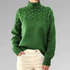 Green women's knit turtleneck sweater with cable-knit texture, long sleeves
