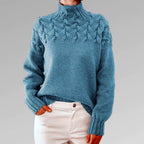 Light blue women's knit turtleneck sweater with cable-knit texture, long sleeves