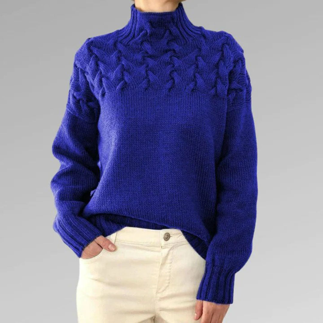 Blue women's knit turtleneck sweater with cable-knit texture, long sleeves