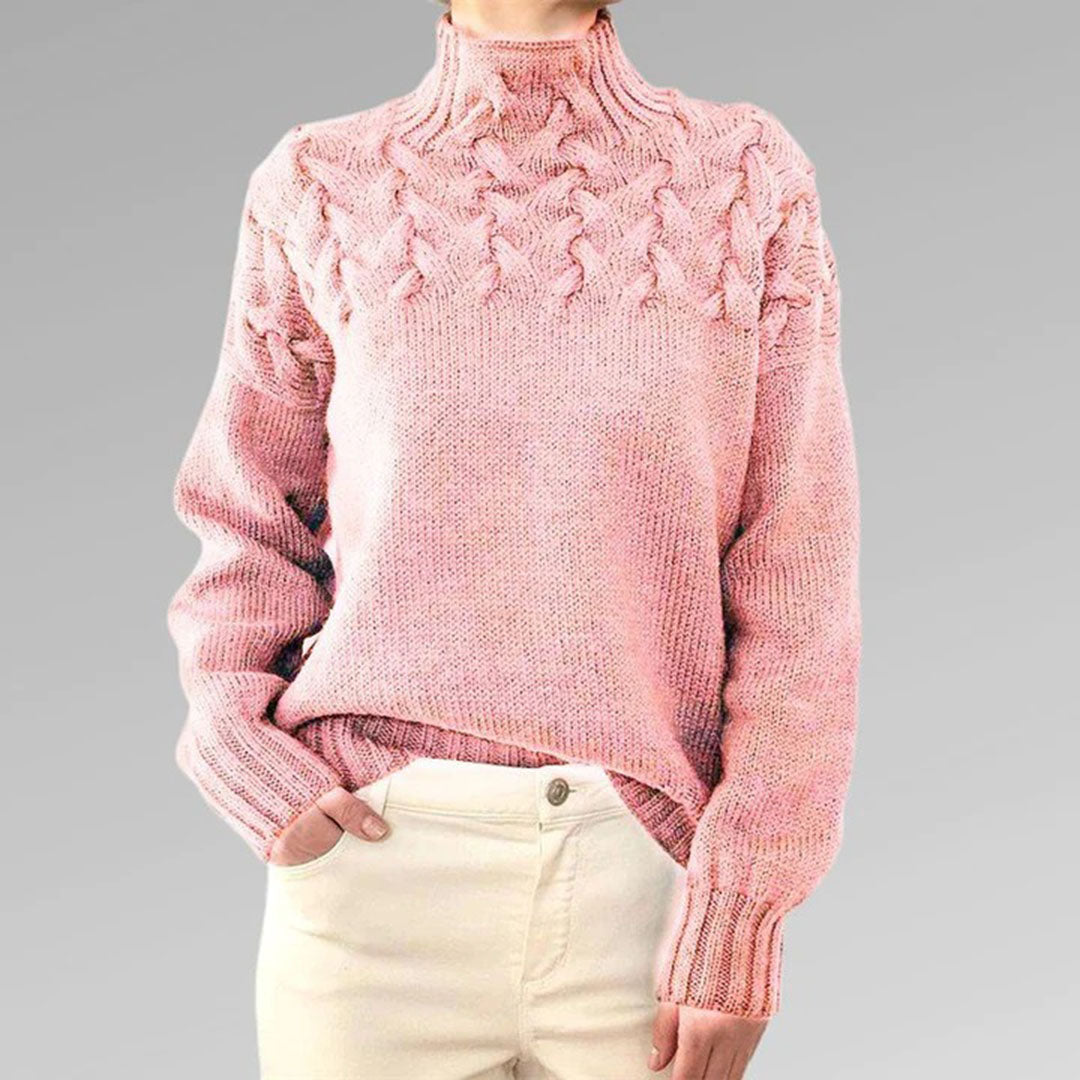 Pink women's knit turtleneck sweater with cable-knit pattern, long sleeves