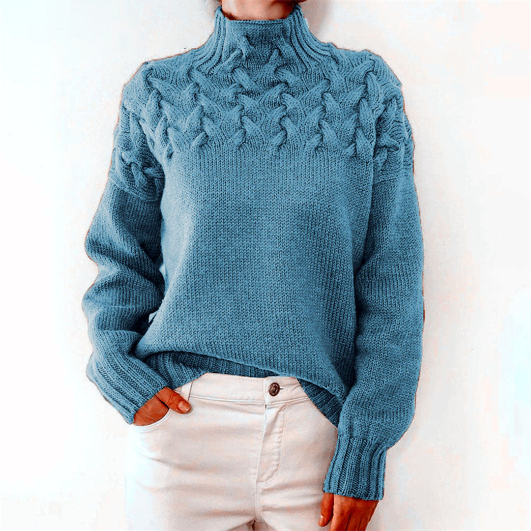 Light blue women's knit turtleneck sweater with raised cable-knit detail, long sleeves