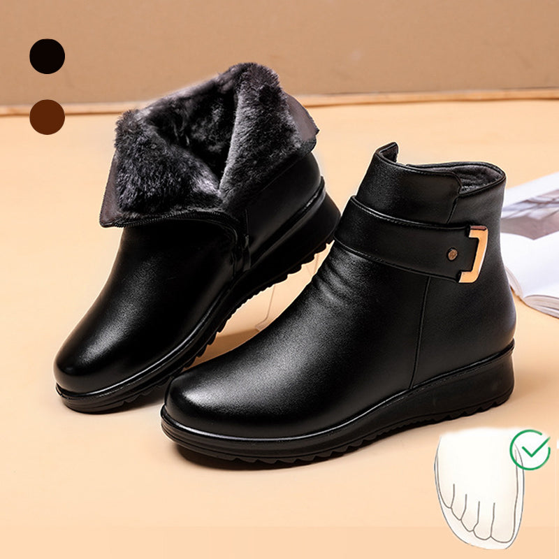 Women’s black ankle boots with faux fur collar and side buckle strap