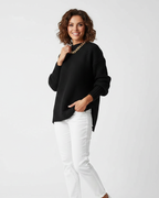 Women's high-neck oversized knit sweater, dark black textured stitch, relaxed fit