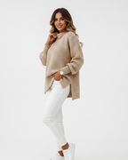 Women's high-neck oversized knit sweater, beige chunky knit with side split hem