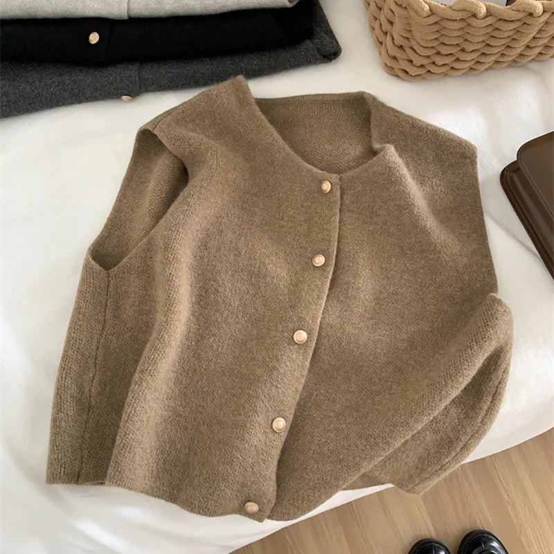 Camel brown merino wool women’s vest with button-front closure and crew neck