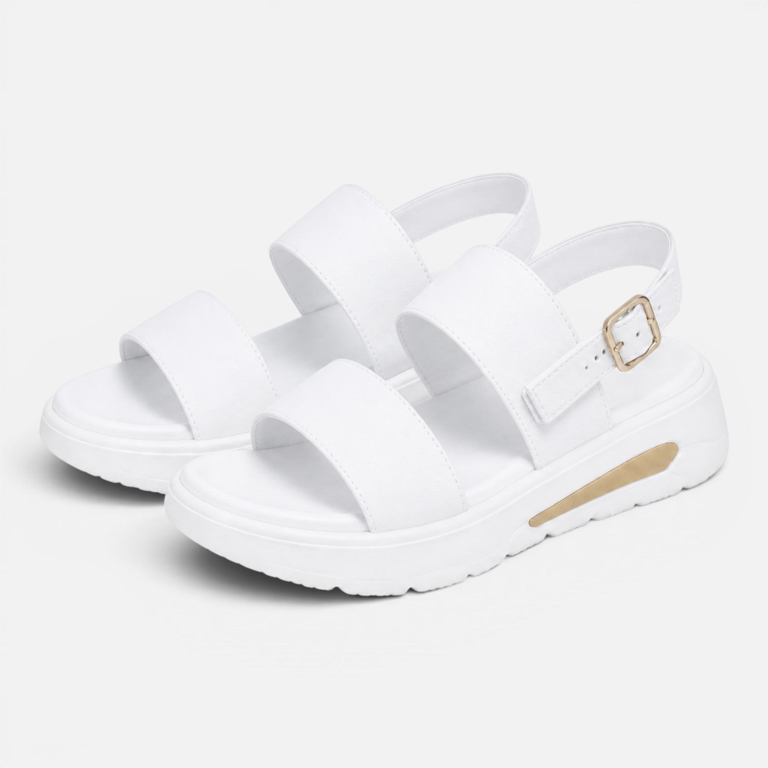 Pair of white platform sandals with wide cross straps and adjustable buckle