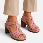 Pink block heel sandals with adjustable ankle strap and strappy upper