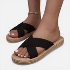 Women’s black cross-strap espadrille slide sandals with wide elastic band sole