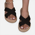 Women’s black cross-strap espadrille slide sandals with shell bead star ankle bracelet