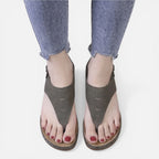 Women’s olive wedge sandals with open-toe thong straps and brown sole