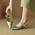 Green pointed kitten heels with pearl strap and gold buckle, low block heel