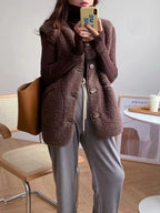 Brown wool-blend sherpa gilet, sleeveless V-neck style with button-front and pockets