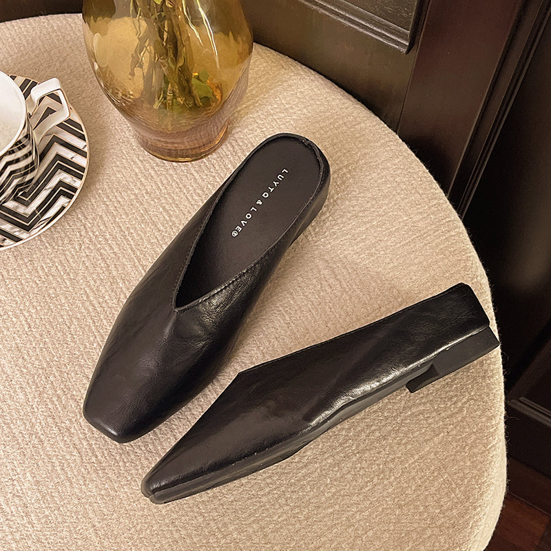 Women's slip-on flats with supportive sole in black