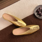 Women's slip-on flats with supportive sole in gold