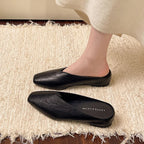 Women's slip-on flats with supportive sole in black