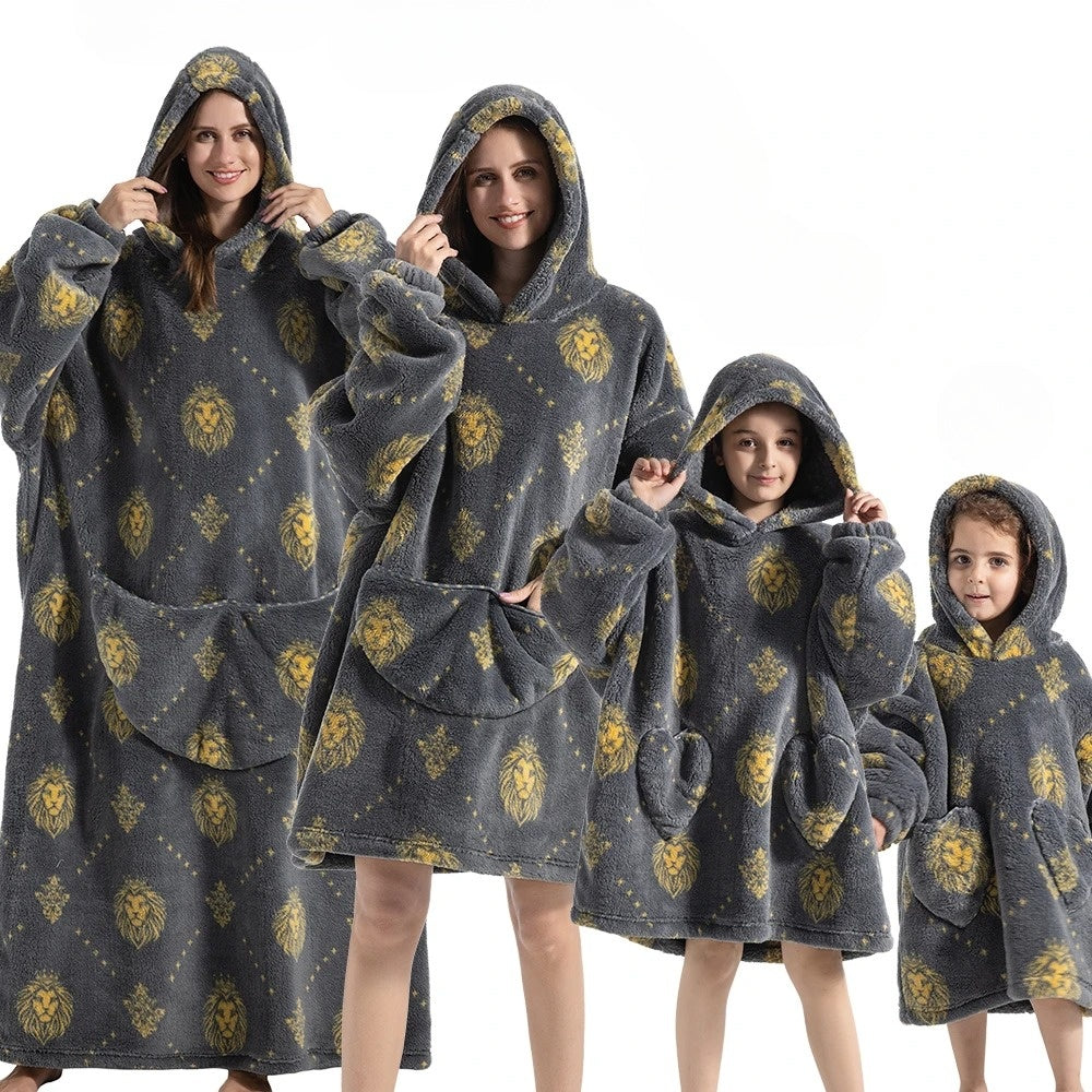 Dark gray hoodie blanket with gold lion pattern and front pocket hood