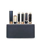 5-in-1 hair styler kit with five attachments standing upright in a black base