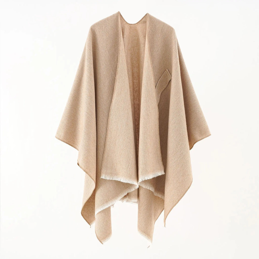 Beige cashmere poncho with V-neck, draped sleeves, fringe hem