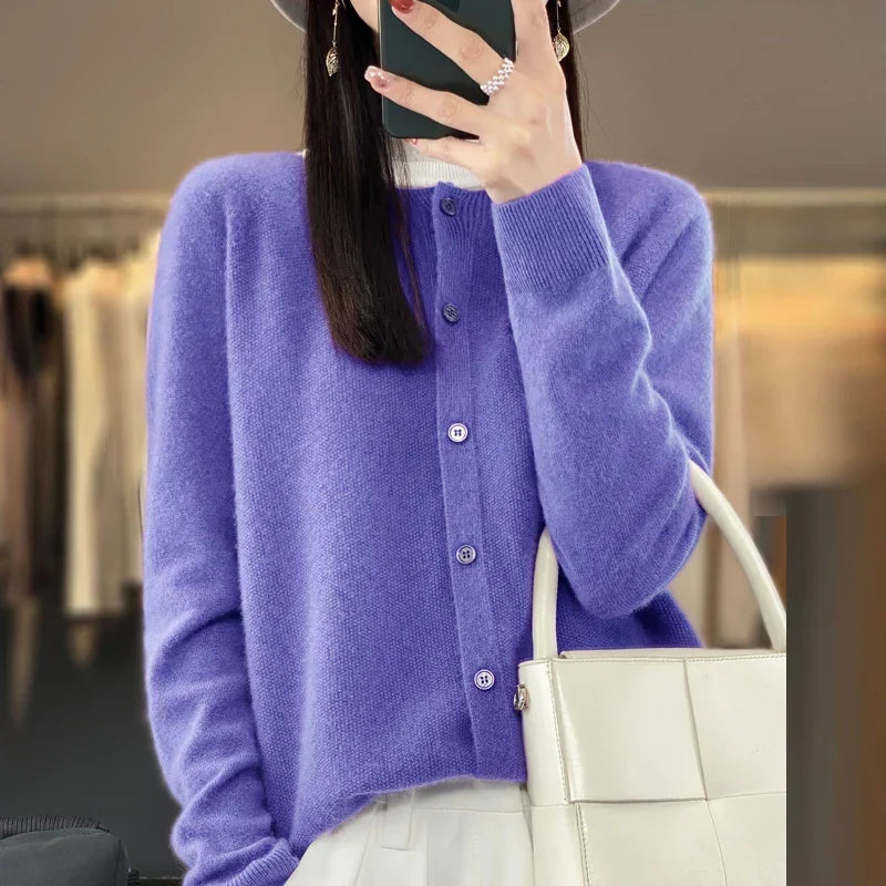 Women’s cardigan sweater, button-front knit, long sleeves, purple knit with buttons.