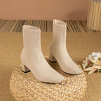 Cream knit ankle boots with stretch sock fit and block heel, pointed toe