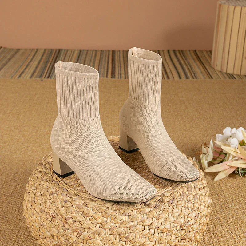 Cream knit ankle boots with stretch sock fit and block heel, pointed toe