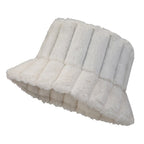 White plush bucket hat with vertical quilted panels and wide frilled brim