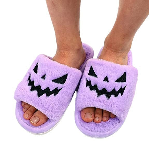 Women's purple plush Halloween jack-o-lantern slide slippers with black stitched face