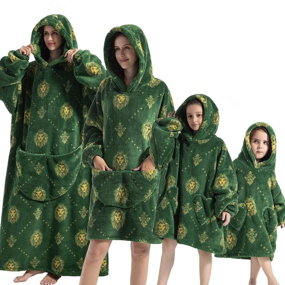 Green hoodie blanket with gold lion pattern and front pocket hood