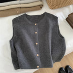 Dark gray merino wool women’s sleeveless vest with button-front placket