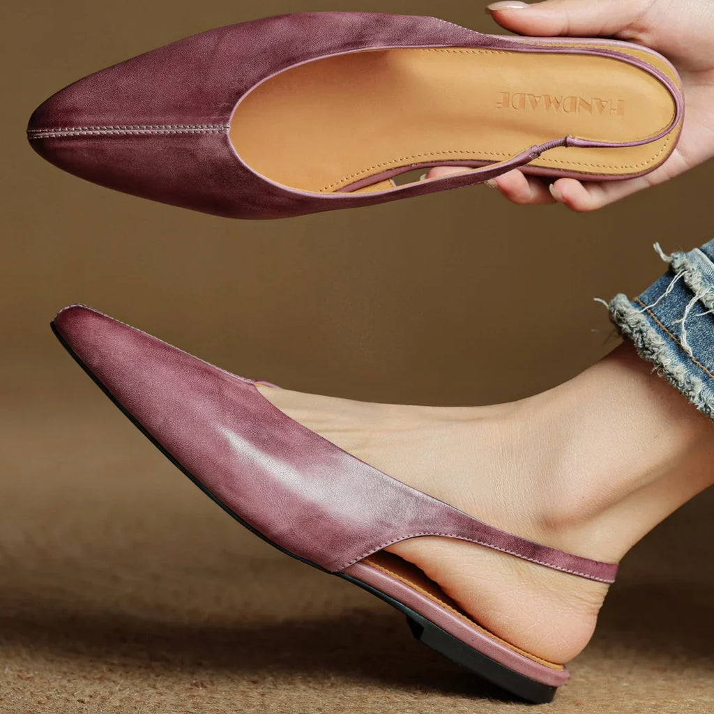 Mauve leather slingback flats, side view of low heel and cushioned footbed