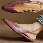 Mauve leather slingback flats, side view of low heel and cushioned footbed