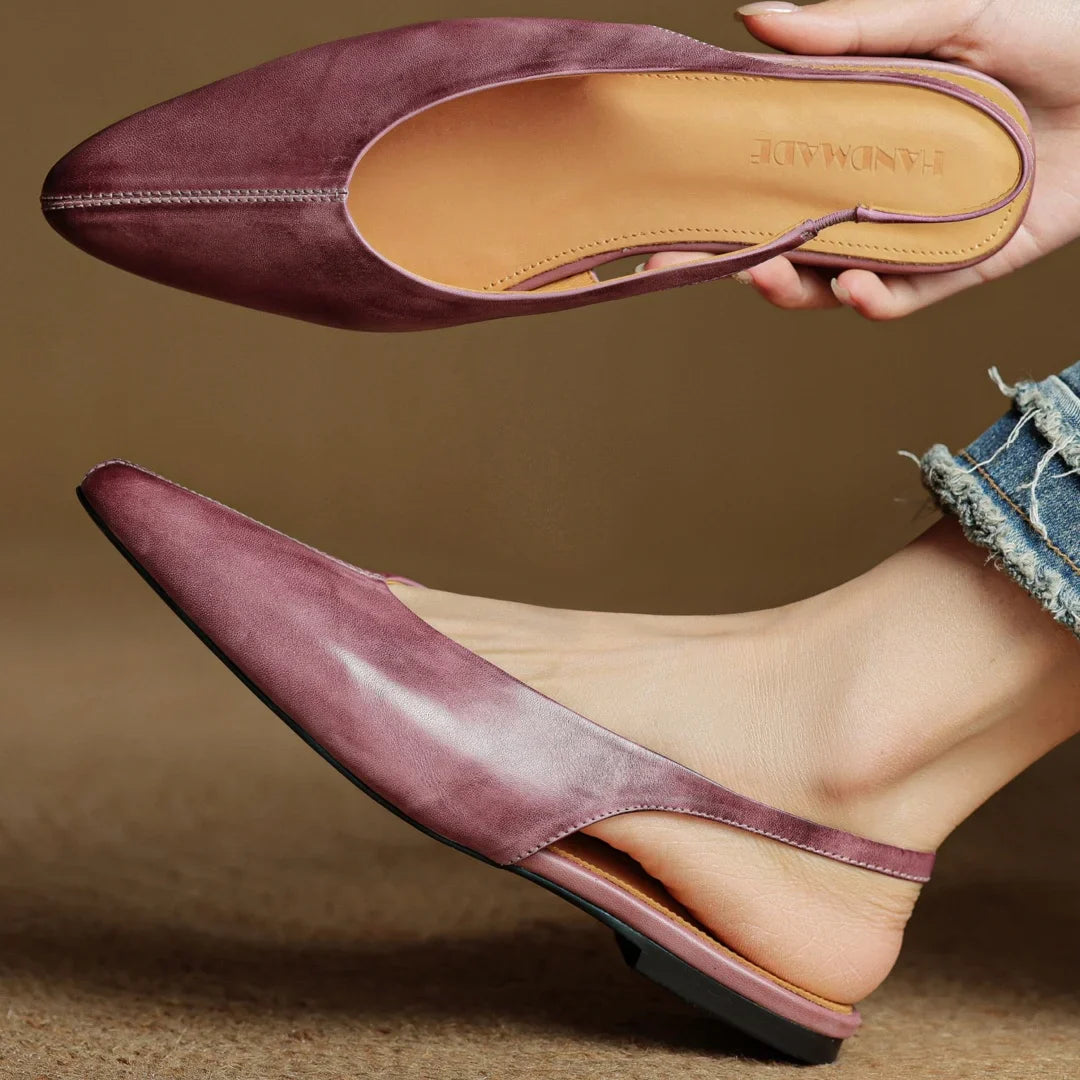 Mauve leather slingback flats, side view of low heel and cushioned footbed