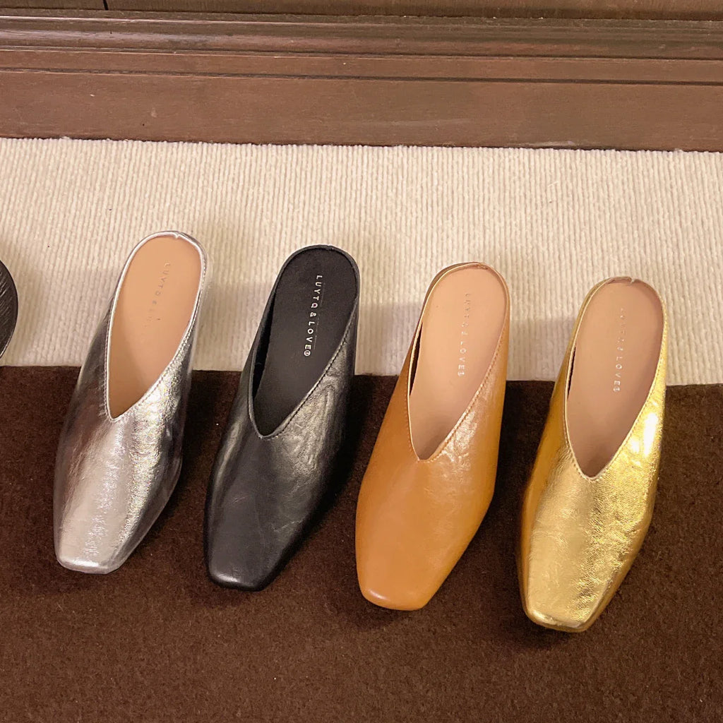 Women's slip-on flats with supportive sole in silver, black, brown, and gold