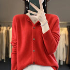 Women’s cardigan sweater, button-front knit, long sleeves, red knit with front buttons.