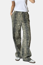 Leopard-print relaxed straight-leg trousers, dark elastic waistband