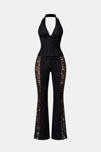 Black halter lace jumpsuit with corset waist and wide-leg flares