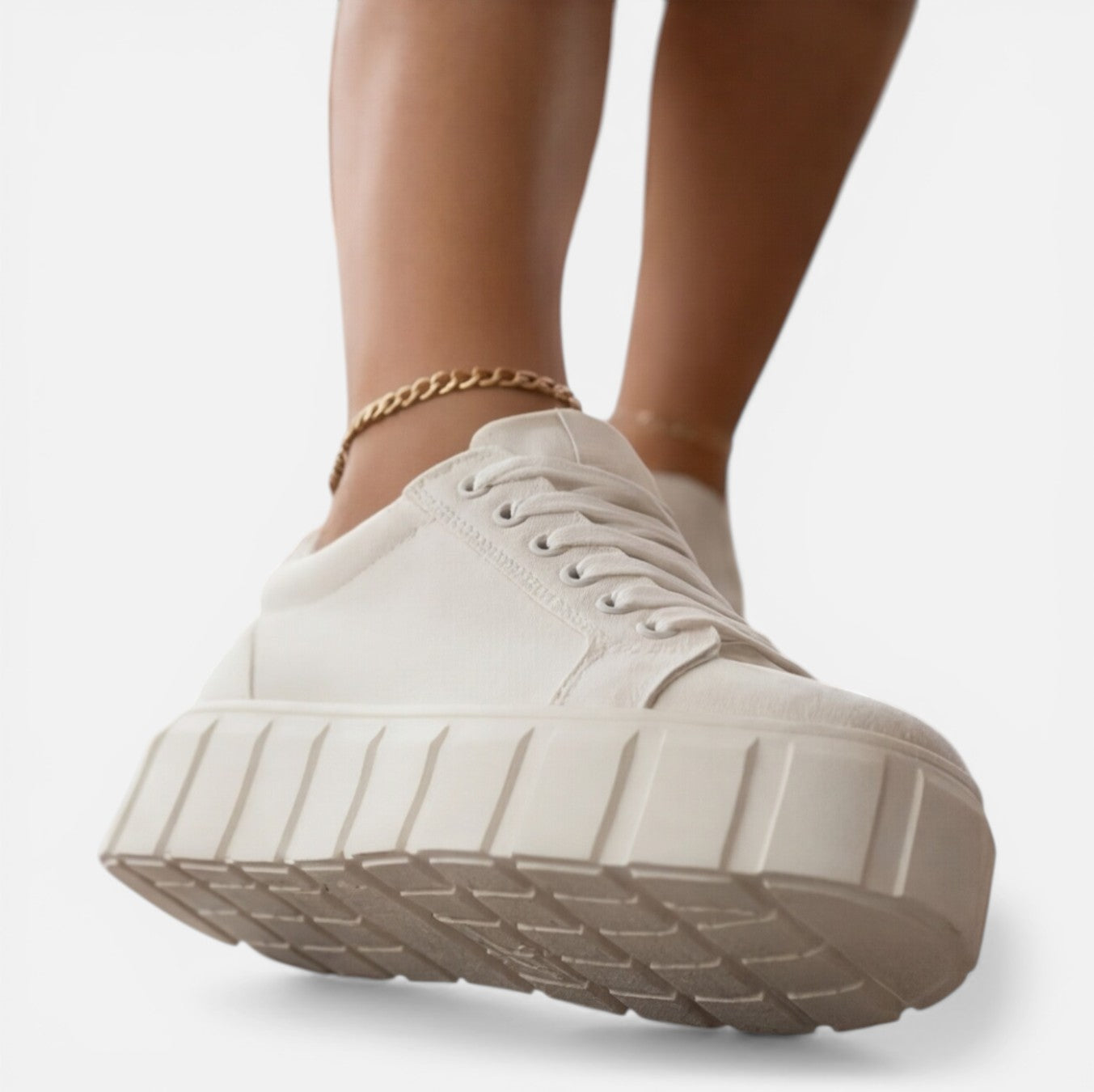 Felorro women's light cream sneakers with white laces and chunky tread sole