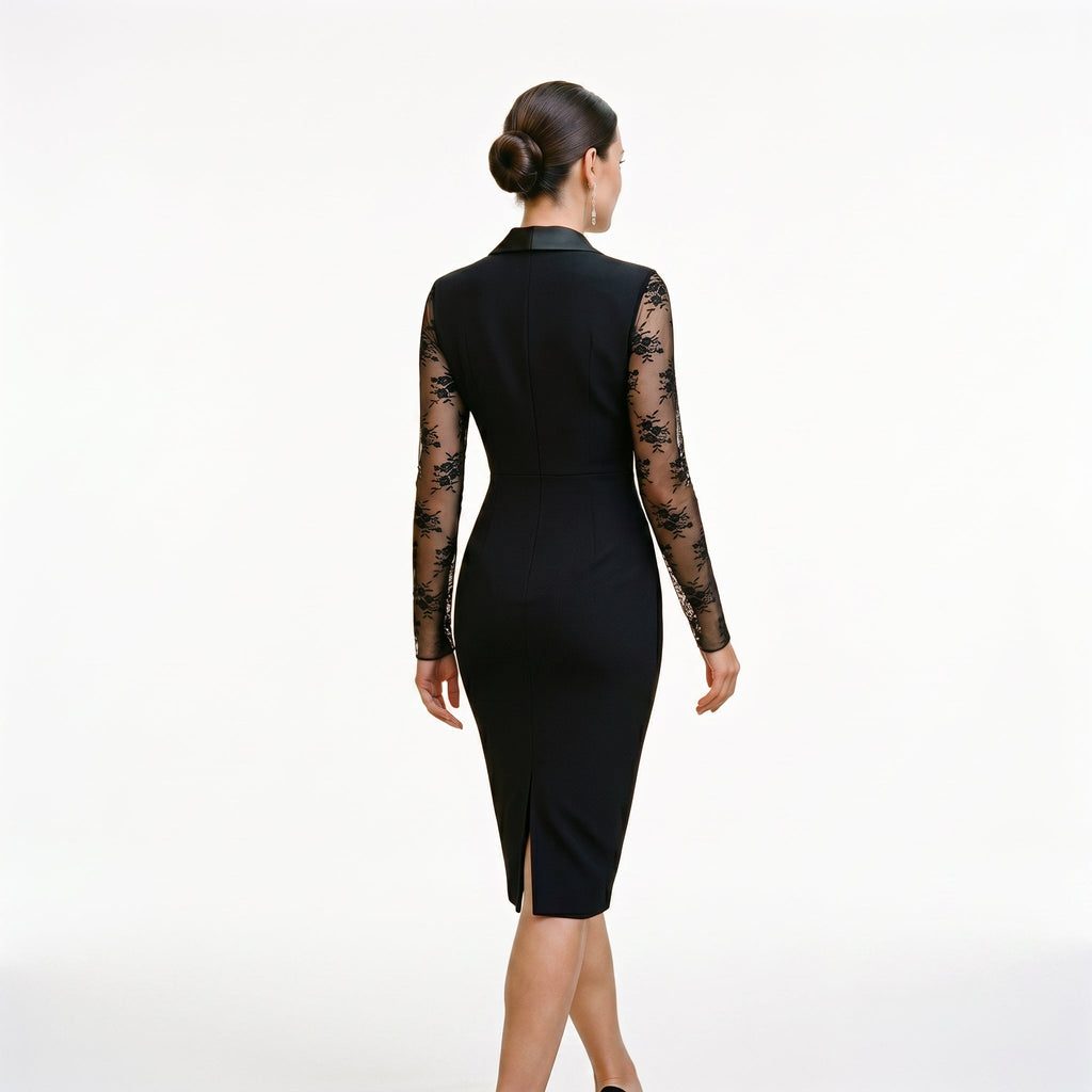 Black lace cocktail dress, back view with fitted sheath shape and long sheer lace sleeves