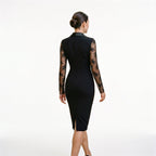 Black lace cocktail dress, back view with fitted sheath shape and long sheer lace sleeves
