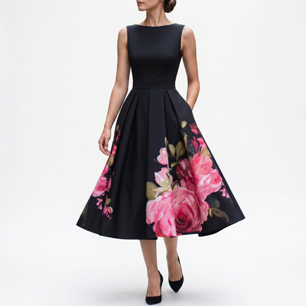 Black midi cocktail dress with sleeveless fitted bodice and pink rose floral skirt
