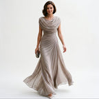 Taupe maxi dress with draped cowl neckline and gathered waist, flowing skirt.