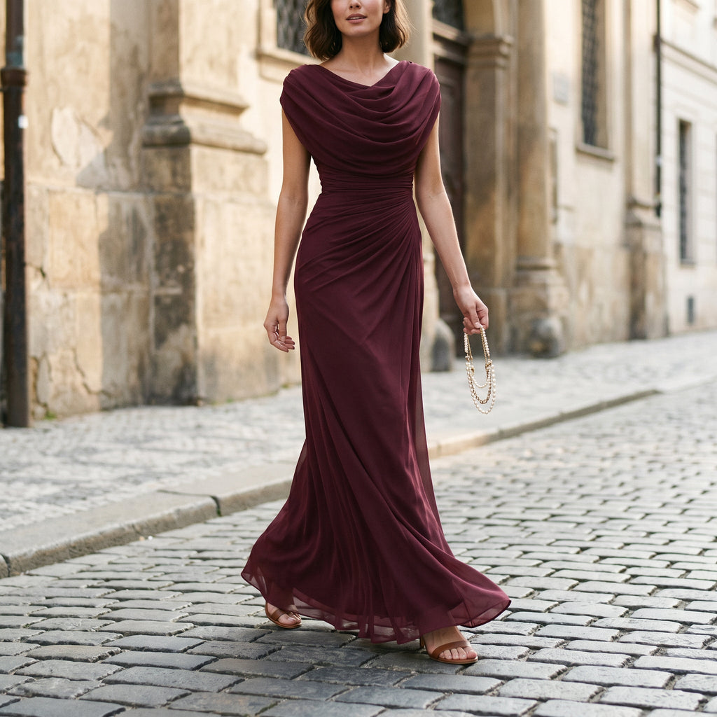 Burgundy maxi dress with draped cowl neckline and twisted waist seam, long hem.