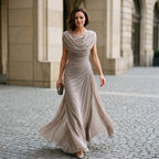 Taupe maxi dress with draped cowl neckline and gathered waist seam, soft drape.