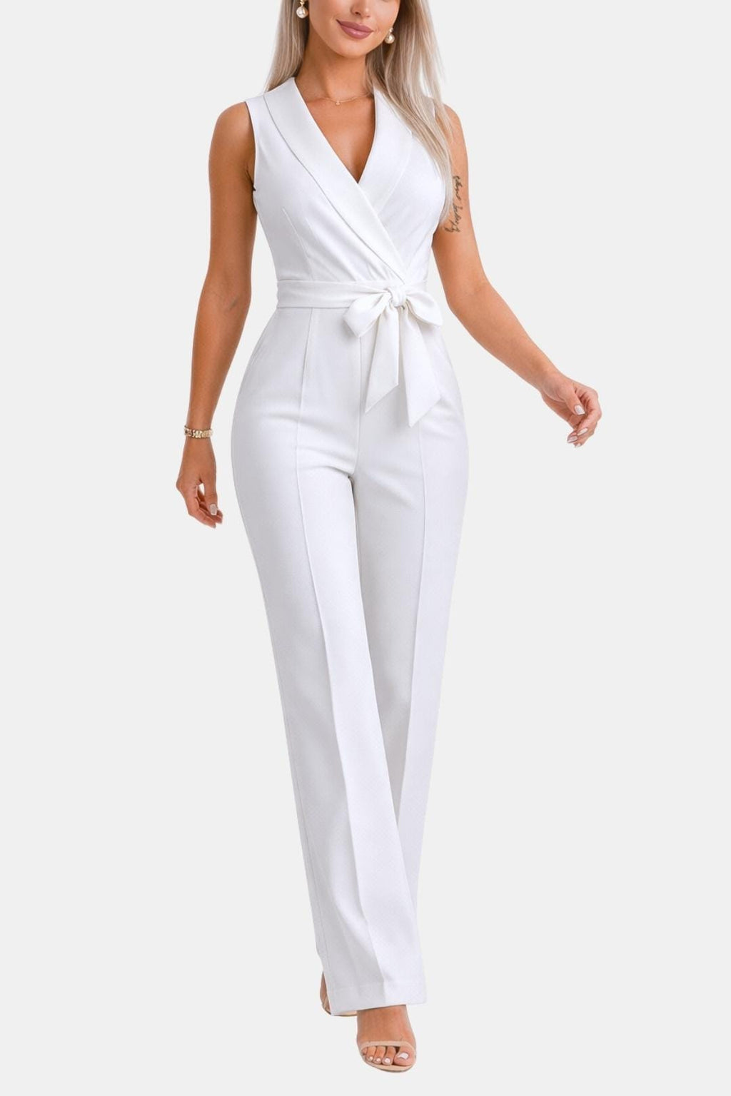 White wrap V-neck jumpsuit with tied waist and tailored wide legs