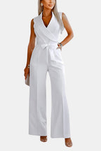 White wrap V-neck jumpsuit with tied waist and wide straight legs