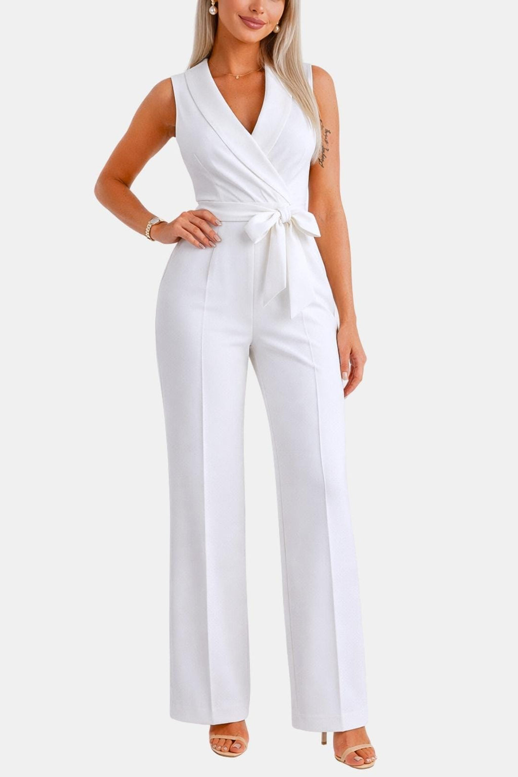 White wrap V-neck jumpsuit with sash tie at waist and wide-leg trousers