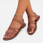 Brown strappy toe-loop flat sandals with ankle strap and ring buckle