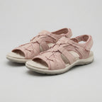 Pink orthopedic sandals with contoured footbed and adjustable straps