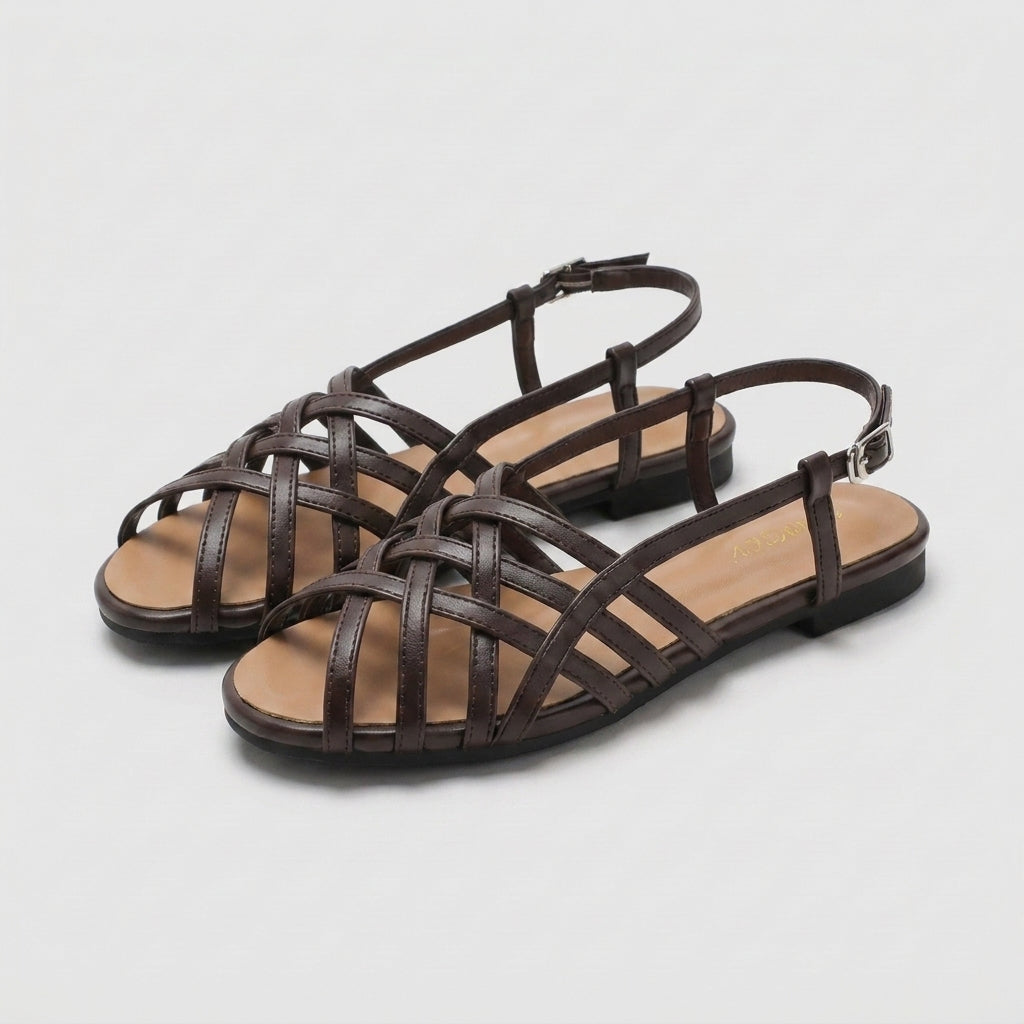 Dark brown woven strap Roman sandals with adjustable ankle buckle and low block heel